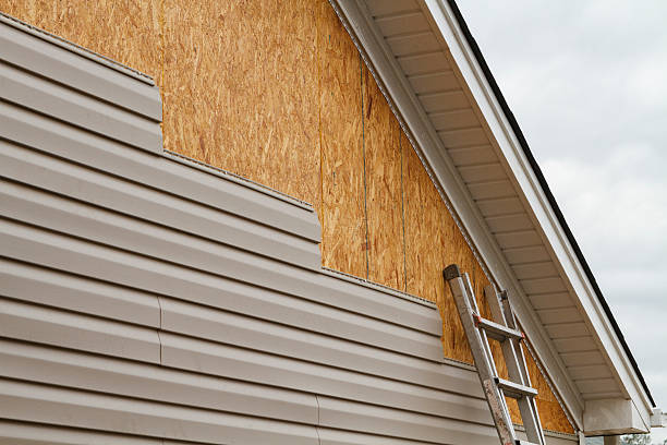 Professional Emergency Siding Repair technician working in Winchester, KY